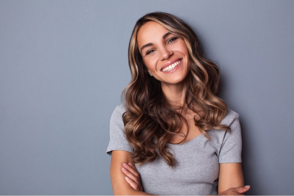 Smiling girl with wavy long hair